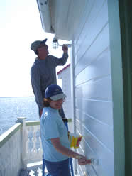 Painting the siding.